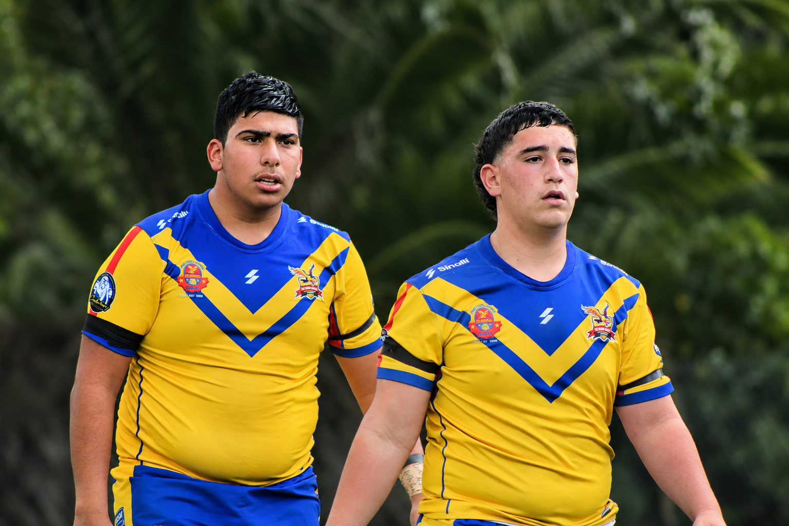 Two rugby league players photographed during a daytime match